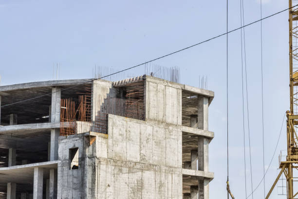 istock Construction of the building. Hoisting crane on blue sky background. 916406702