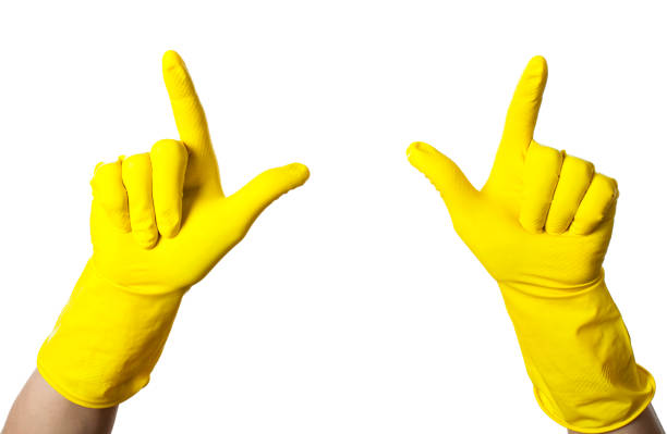 istock Yellow cleaning gloves on isolated 916407140