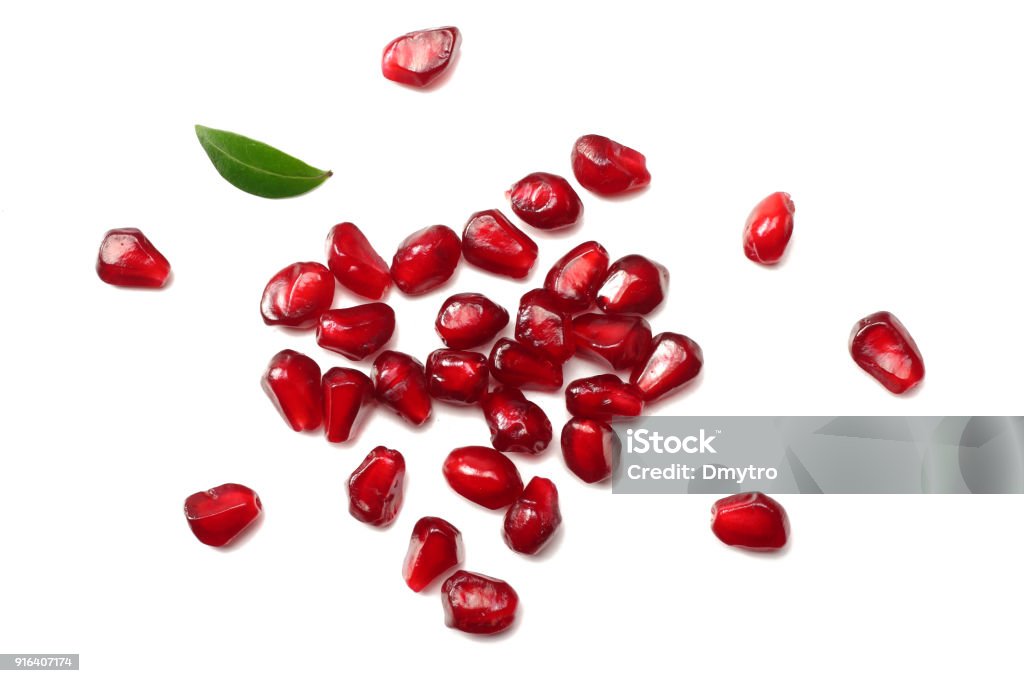 pomegranate seeds isolated on white background. top view. pomegranate berries. Pomegranate Stock Photo