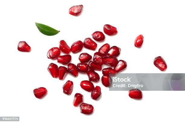 Pomegranate Seeds Isolated On White Background Top View Pomegranate Berries Stock Photo - Download Image Now