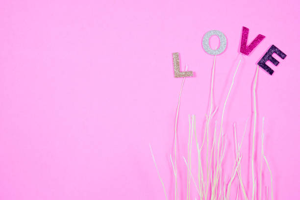 istock Love concept absract background with mini red heart on pink background included copyspace for add text or graphic 916408030