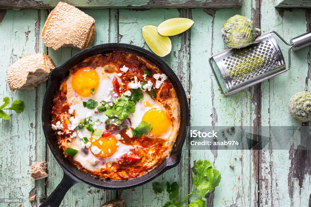 Shakshouka, Fried Eggs and Tomato Sauce, Israeli Dish Bell Pepper Stock Photo