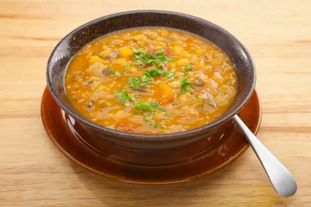 Armenian lentil soup, a homely soup for a winter evening, with a twist. Besides lentils, eggplant, onion, carrot, celery and green capsicum, it also contains apricots, cinnamon, allspice and paprika. Delicious!