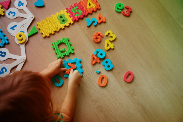istock little girl learning numbers and math 916414136