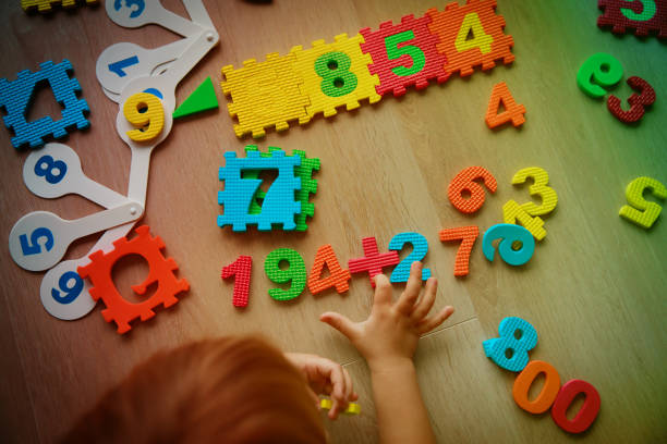 istock little girl learning numbers and math 916414180