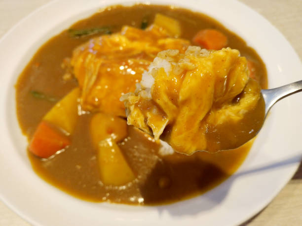 istock Close up Japanese vegetable curry and egg with rice 916417386