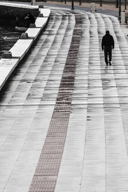 istock Man walking at seaside in Izmir (Turkey) 916417530