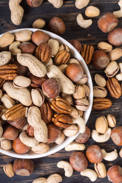 istock Mix of nuts in plate 916421586