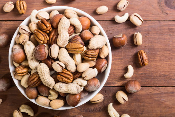 istock Mix of nuts in plate 916421610