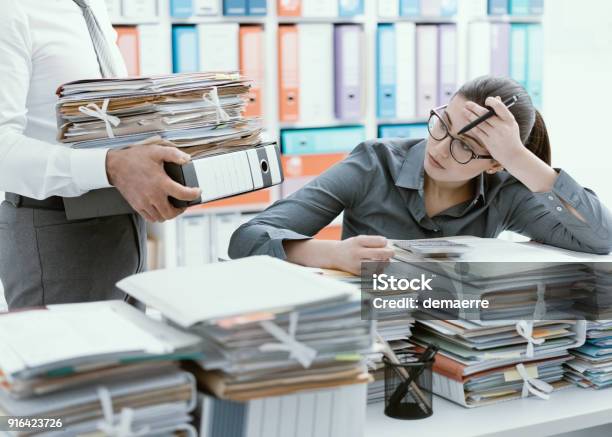 Young Secretary Overwhelmed By Work Stock Photo - Download Image Now - Emotional Stress, Paper, Office