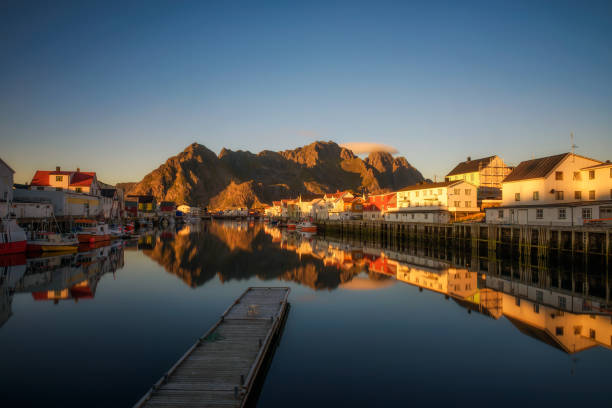 Sunset at Henningsvaer, fishing village located on several small islands in the Lofoten archipelago, Norway. Long exposure.