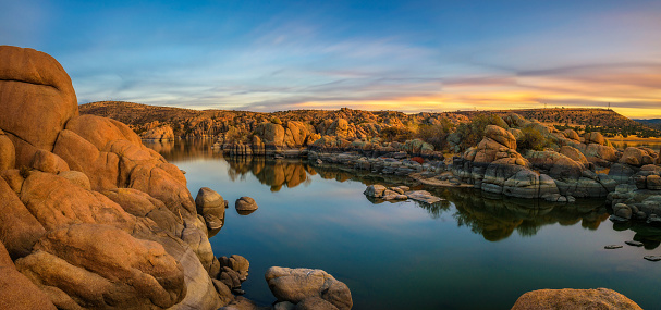 Sunset above Watson Lake in the Granite Dells of Prescott, Arizona. Long exposure.