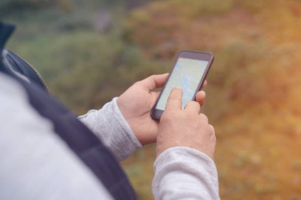 istock Male hand holding mobile phone 916432890