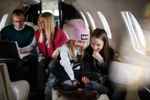 istock Family in the airplane 916436468