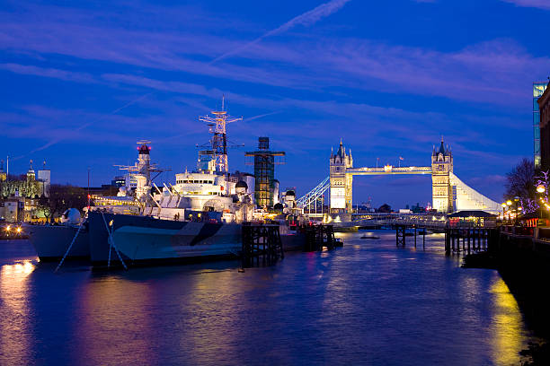 HMS Belfast and Tower Bridge, London stock photo