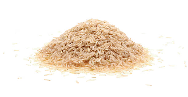 istock A mound of brown rice grains isolated on white 91644593