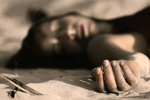 dead woman on the sand  dead person stock pictures, royalty-free photos & images