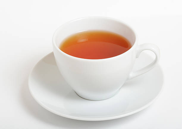 tasse schwarzen tee - tea cup stock-fotos und bilder