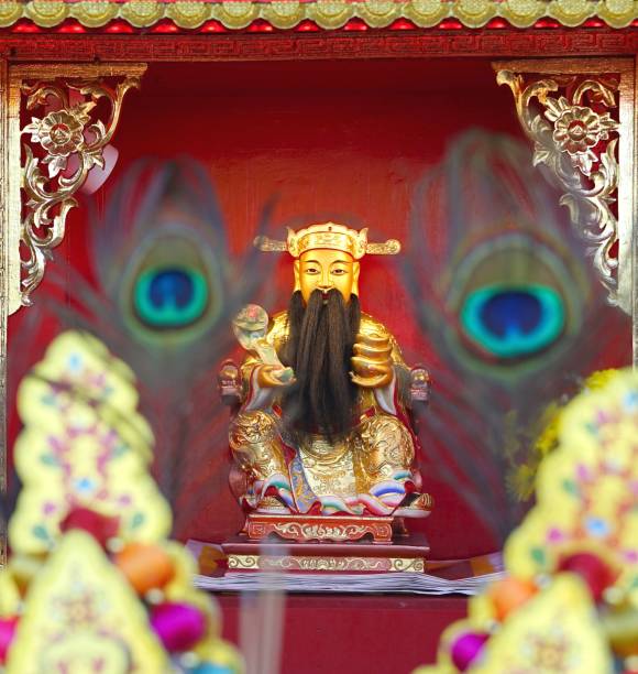 Cai Shen, Chinese God of wealth or  God of fortune statue in Chinese temple stock photo