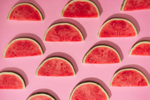 istock Watermelon pattern. Sliced watermelon on white background. Flat lay, top view 916467022