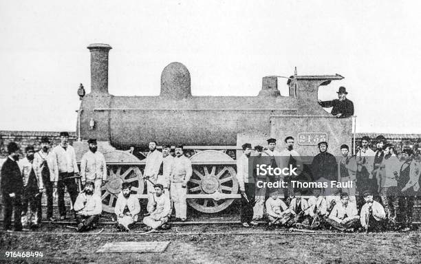 Engine Made In 25 Hours On 6th February 1893 With Workmen Stock Photo - Download Image Now