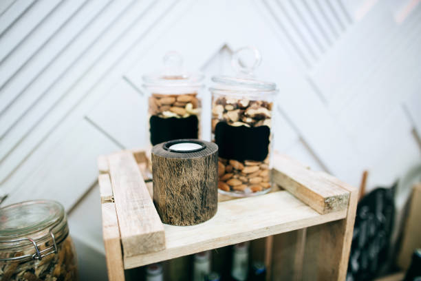 istock Nuts in glass jars on a wedding buffet table snacks 916468514