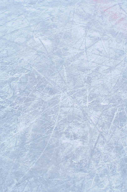 Gray and white toned ice background ice background for skating and hockey - shallow dof focus in the middle ice rink stock pictures, royalty-free photos & images