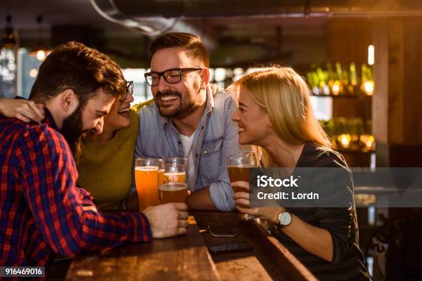 Friends In The Pub Stock Photo - Download Image Now - Adult, Adults Only, Alcohol - Drink