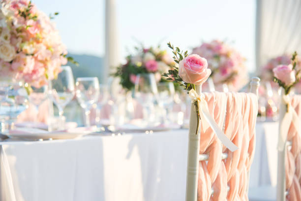 istock Table setting at a luxury wedding and Beautiful flowers on the table. 916472110