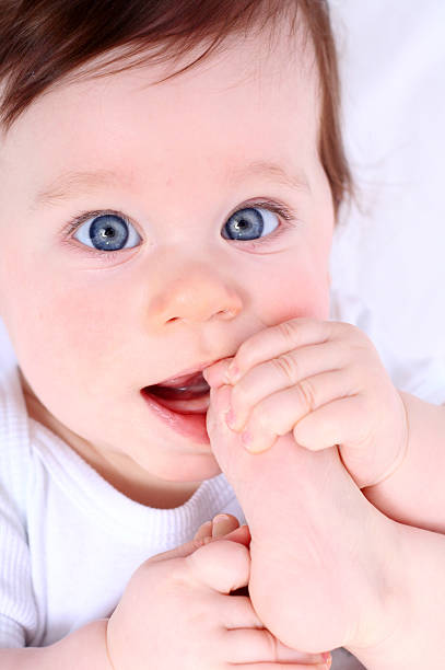 istock Cute baby eating her foot 91647294
