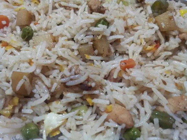 Basmati Rice Pulao or pulav with Peas, or vegetable rice using green peas also known as matar pulao