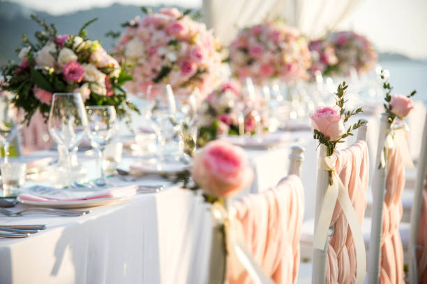 istock Table setting at a luxury wedding and Beautiful flowers on the table. 916475412