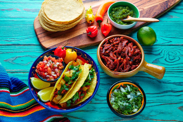 istock Tacos al pastor Mexican with coriander pineapple 916475518
