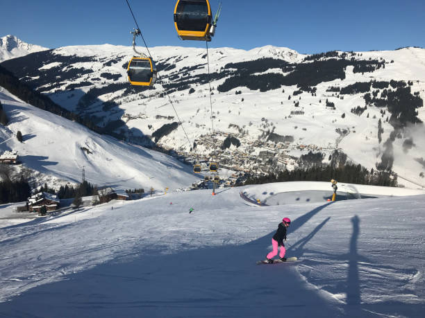 female snowboarder on piste