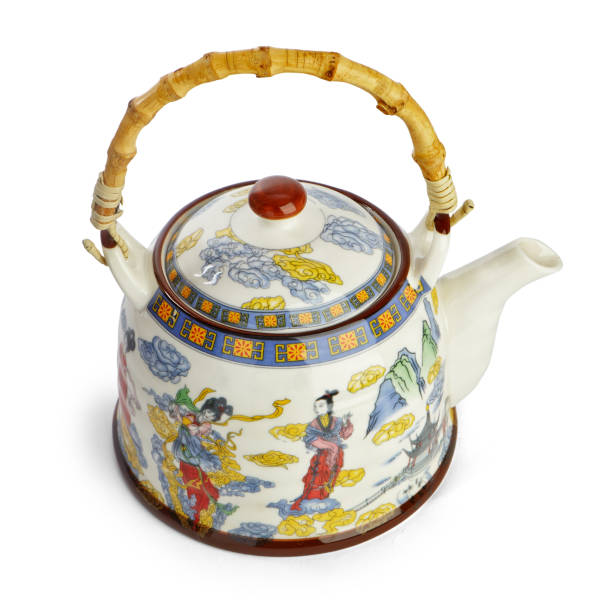 istock Porcelain teapot with a Chinese engraving with Clipping path. 916478660