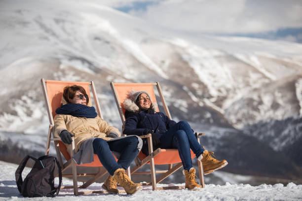 istock Sunbathing On Snowy Winter Day 916485948