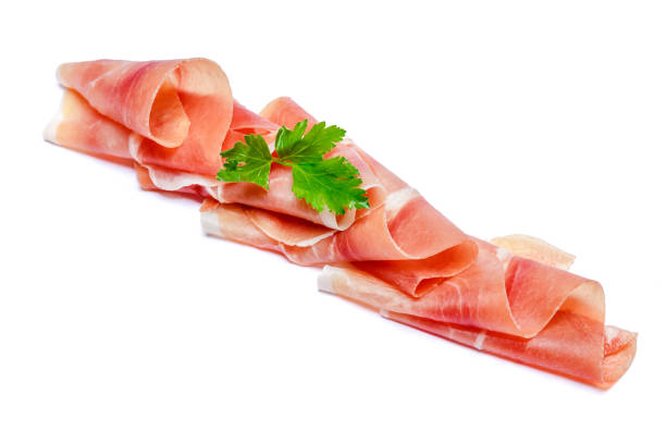 istock Italian prosciutto crudo or spanish jamon. Raw ham on white background. 916486004