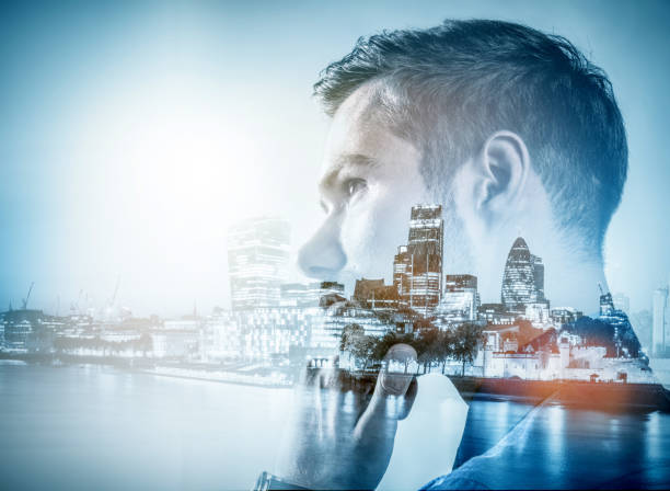 istock Young businessman thinking. Double exposure city background. 916493066