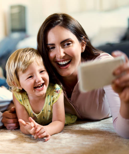istock Mom's cute little munchkin 916493702