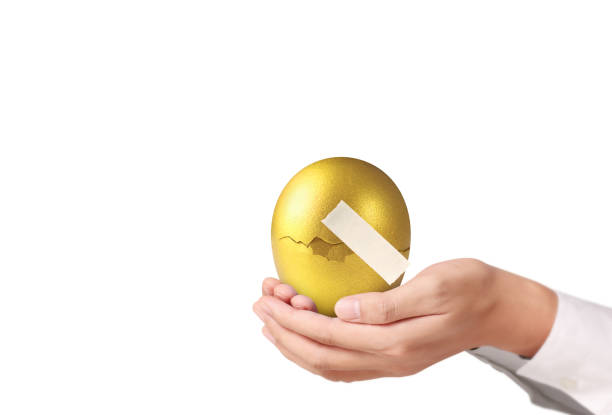 istock Holding Of Golden Eggs 916496858