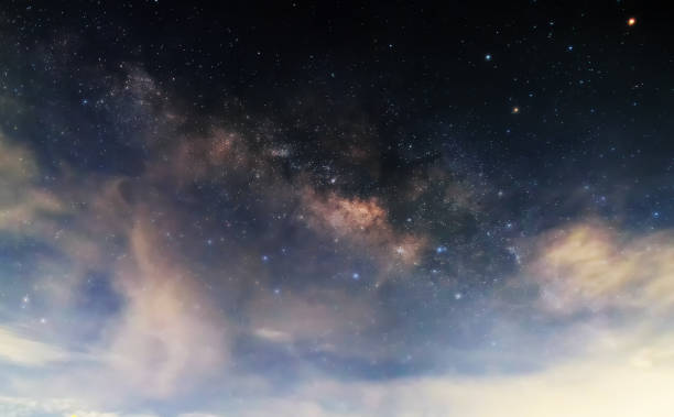 istock Milky Way in the night sky. (No background on the details). 916497012