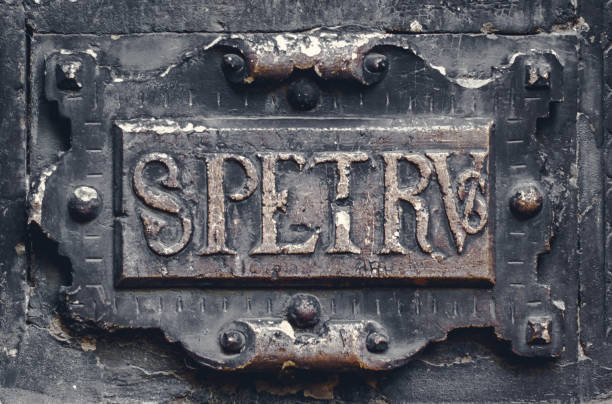 istock Ancient vintage bas-relief frame with an inscription on an old church 916507150