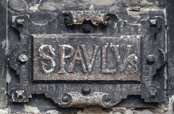 istock Ancient vintage bas-relief frame with an inscription on an old church 916510758