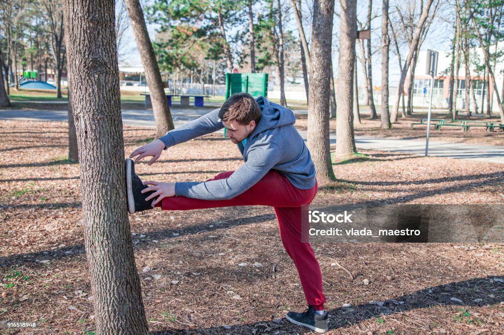 Men stretching before workout outdoors 20-29 Years Stock Photo