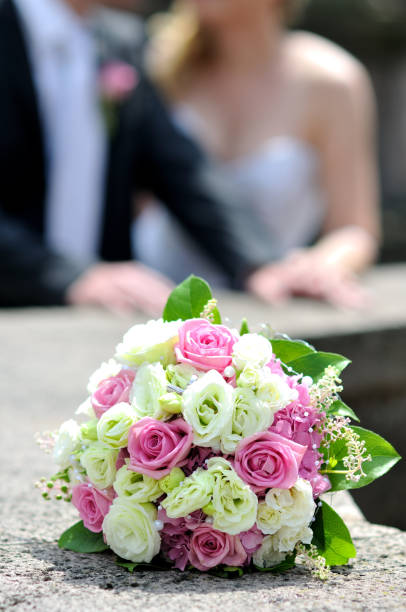 weddings bouquet and rings stock photo