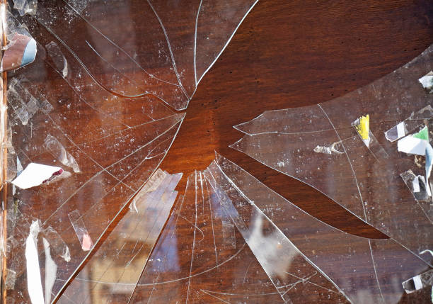 istock Broken shopwindow closeup in summer 916523178