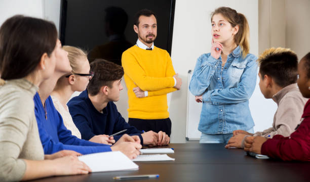 istock Girl in class ready giving good 916526628