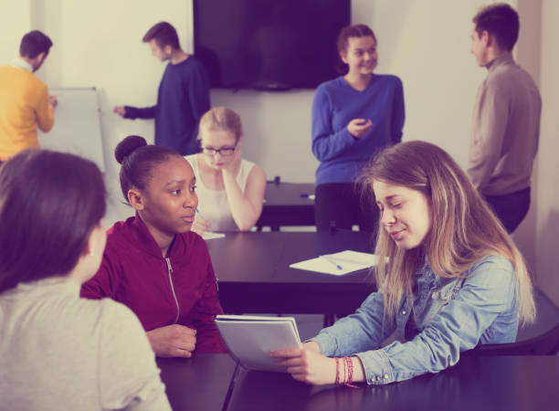 istock Girl consulting fellow student 916526650