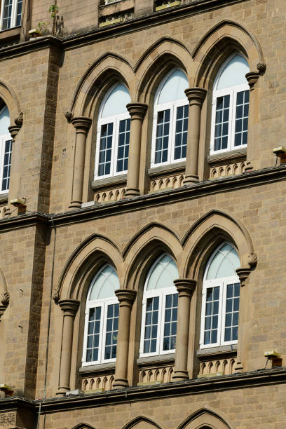 istock Architecture: Close up of Lancent Arched Windows with Glass Pane 916531092