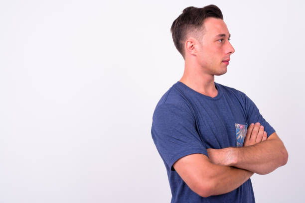 istock Portrait Of Young Man Against White Background 916534216